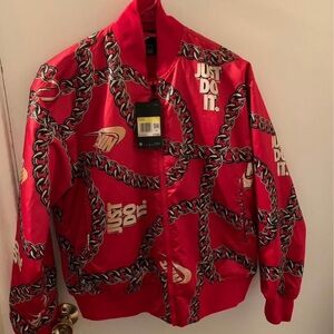 Nike Women's Red Jacket with Chain Design